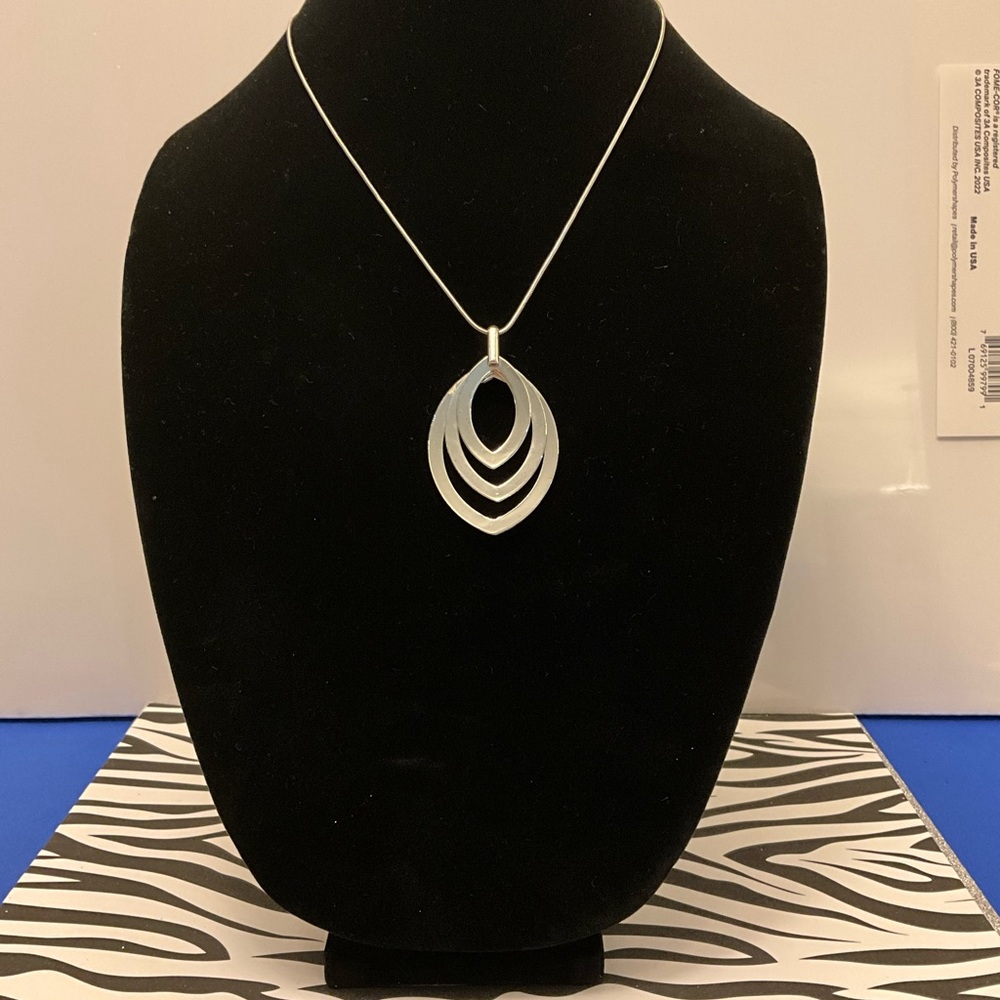 Silver 3 layer contemporary pendant on 17” silver chain